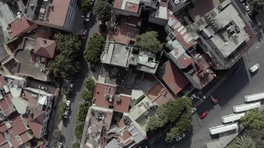 Aerial birds eye view of busy city streets at day