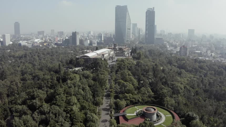 Skyline of the city with tall buildings and skyscrapers next to the public park