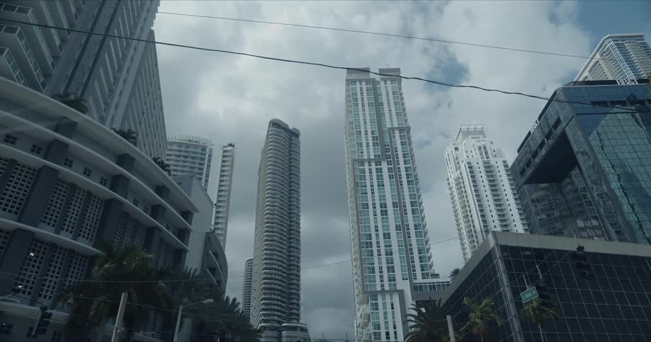 Tall skyscrapers are standing tall in the downtown city