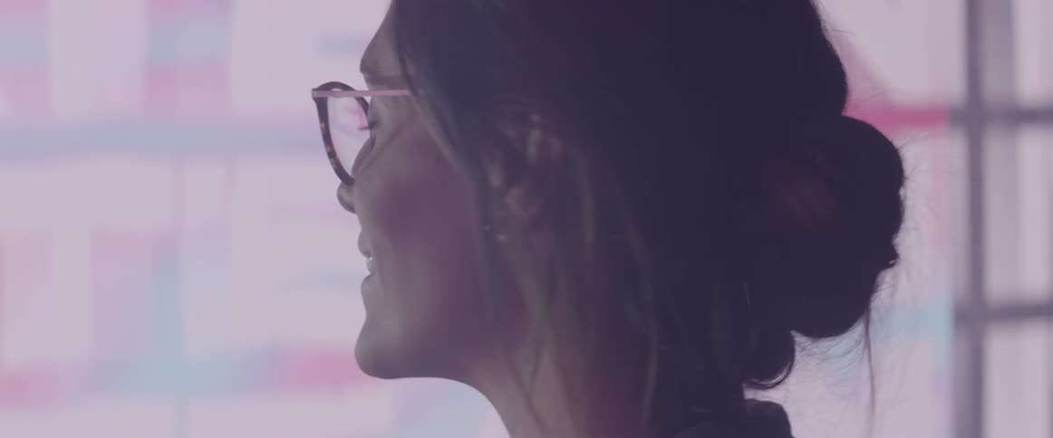 A portrait of a middle age woman with glasses