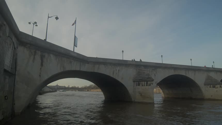 A scenery of a bridge on the river
