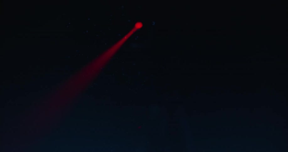 An abstract red light on the dark