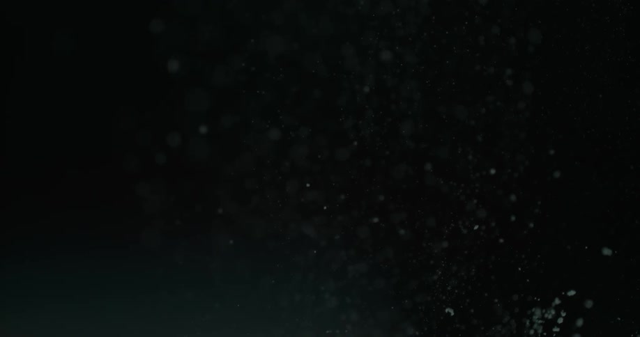 Bubble effect rising from the bottom of a black screen
