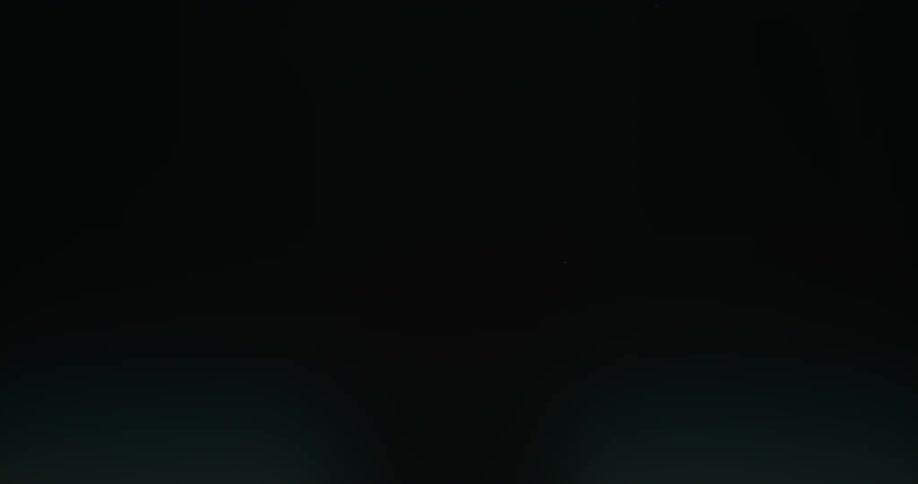 The bubbles flow up in the dark water