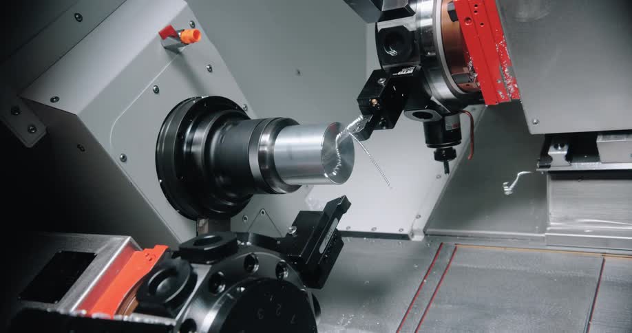 The machine spins as it is cut by a tool