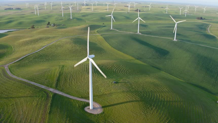 A farm of wind turbines generating power