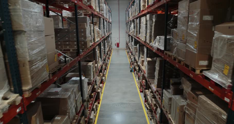Wide aisle separates two lines of storage in a warehouse