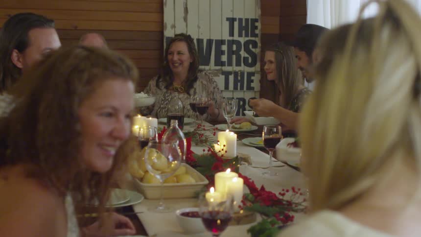 A family gathered around a table for a holiday meal