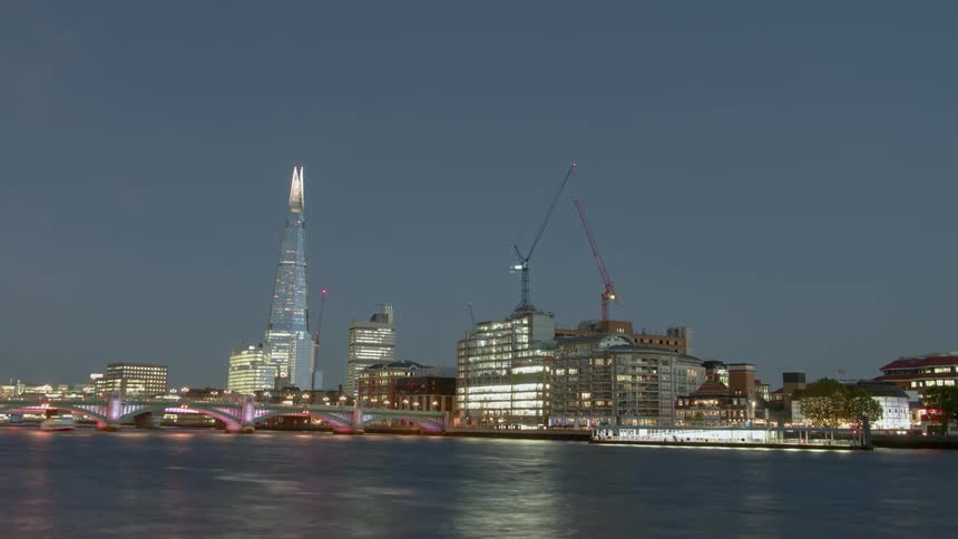 The buildings light up at night
