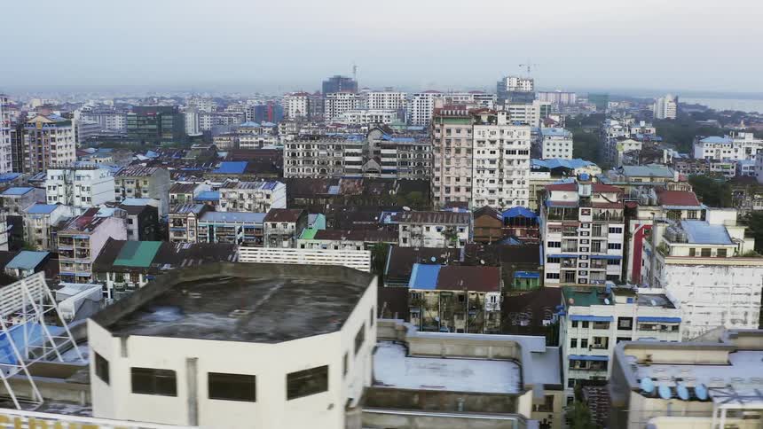 A city with buildings and roads and the sky in the background