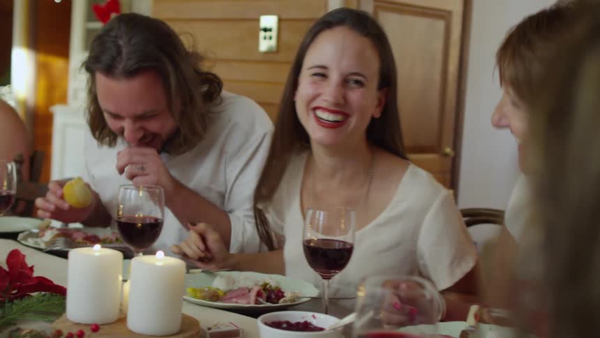 A family laughing over a meal