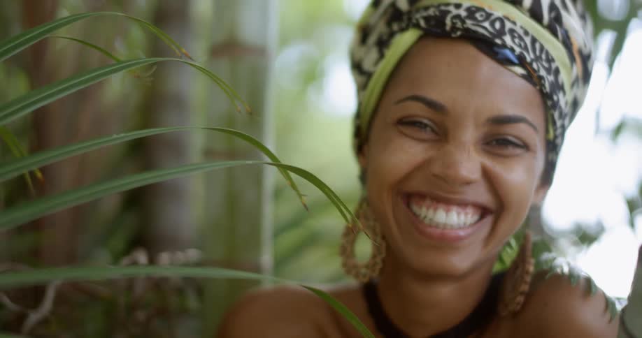 A woman begins to laugh