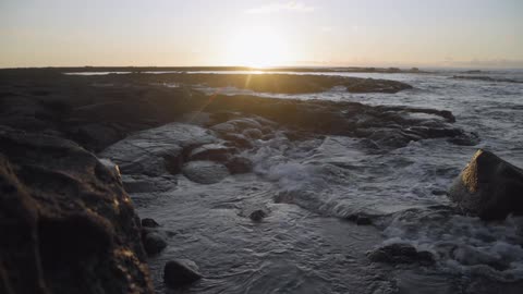 Waves hitting a rocky coastline