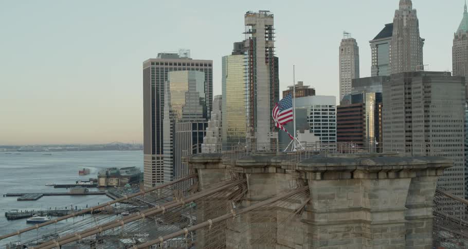 Aerial view of brooklyn bridge with horizontal and diagonal suspender cables in new york city at dusk