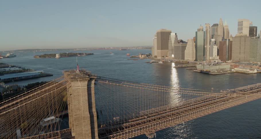 The brooklyn bridge heading into downtown new york city