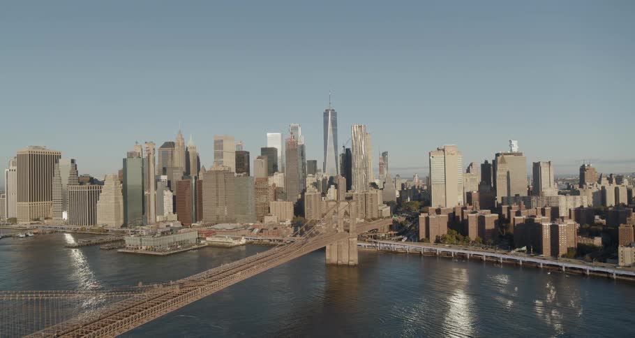 A bridge leading to a downtown city skyline