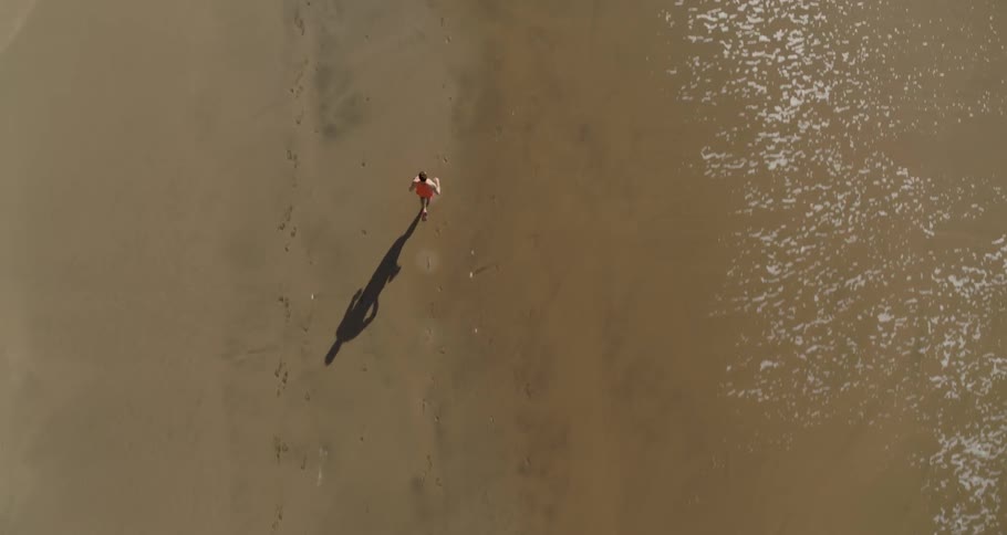 A person running on the beach