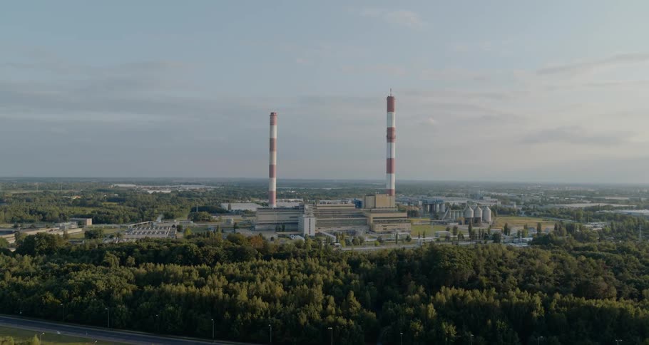 Aerial view of two utility towers in a suburban area