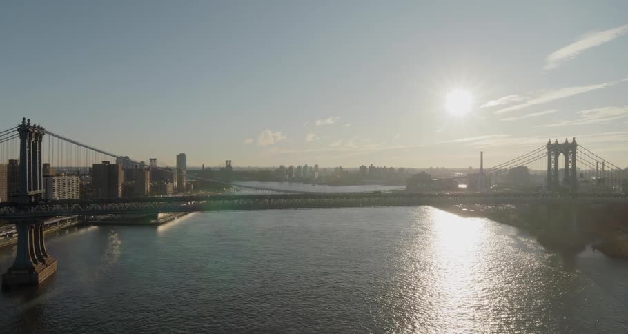Suspension bridge spans river connecting downtown to the rest of the city