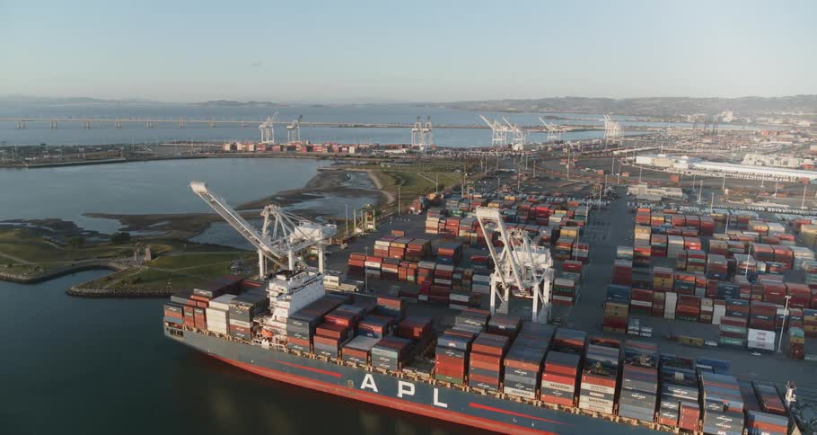 A shipping container port with cranes
