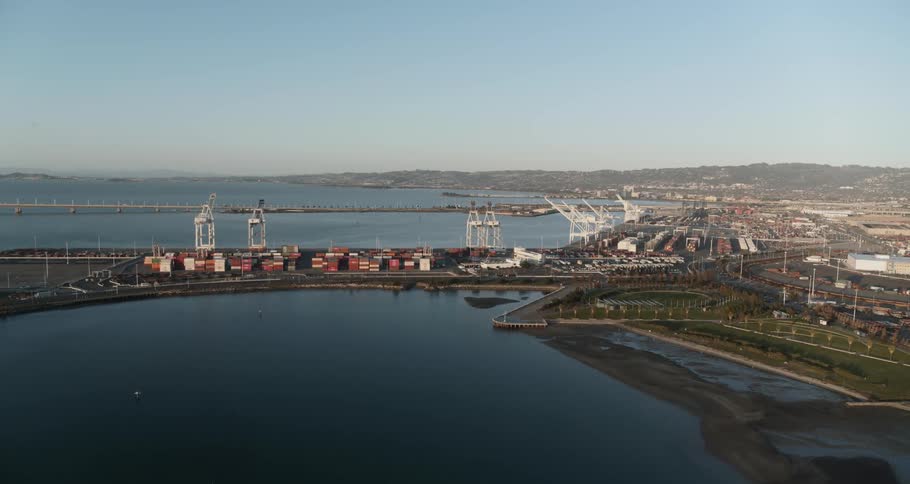 Cranes and shipping containers along the waterfront