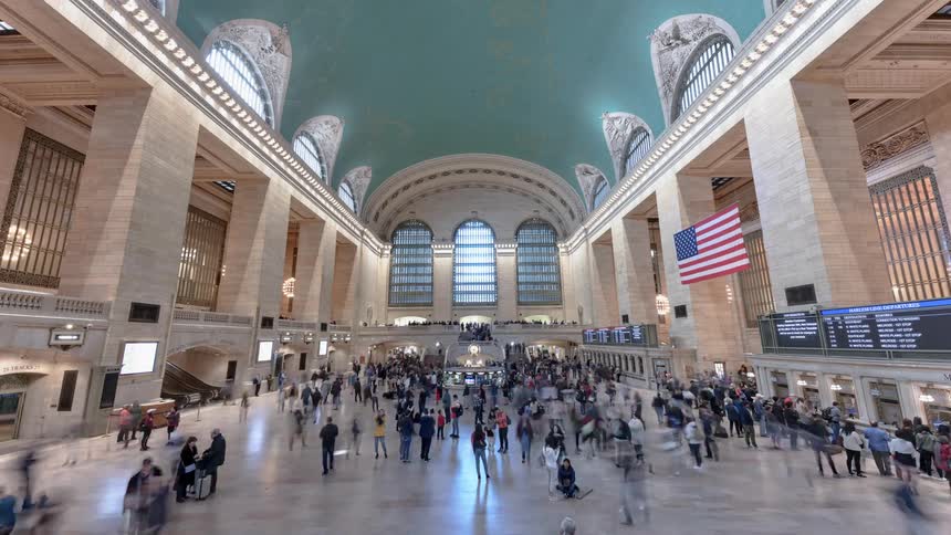 People moving around a the inside of a building