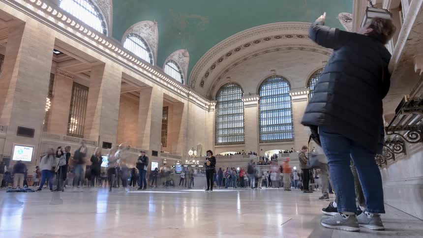 Time lapse of people in a train station