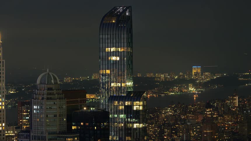 A downtown skyline full of lights at night