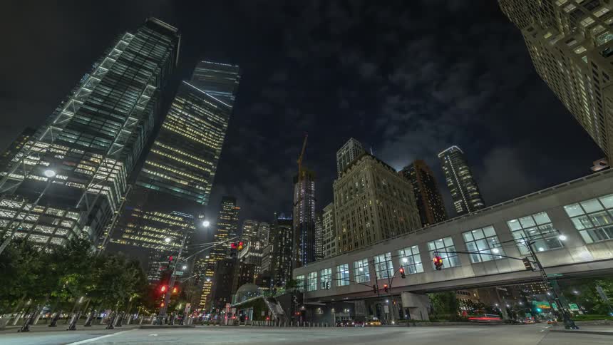 Traffic travels in the city at night
