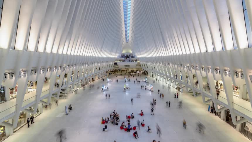 Hundreds of people walk a travel terminal