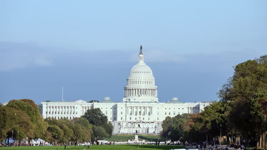 People move around by the capitol building