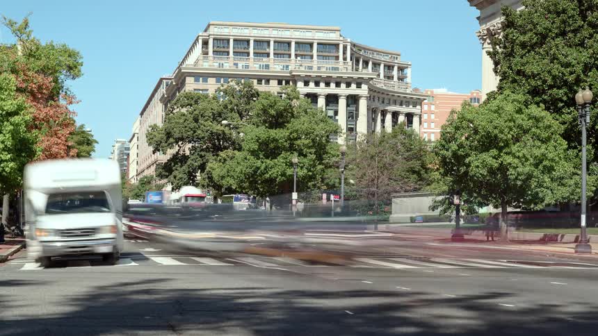 Time lapse of a busy intersection in city downtown
