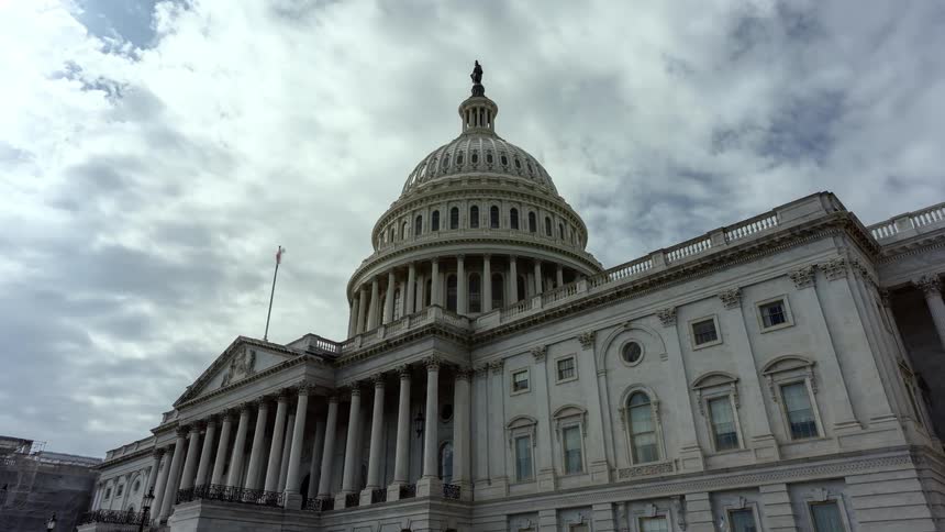 Clouds pass over capitol building dome