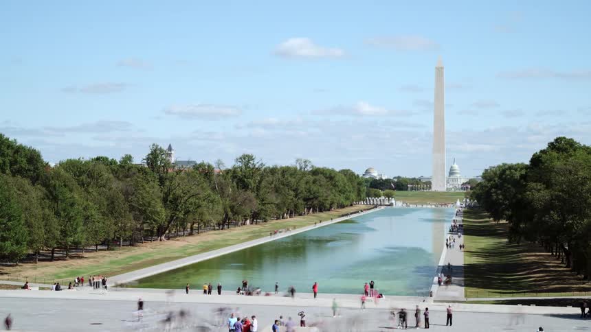 Tourists walking around the national mall during the day