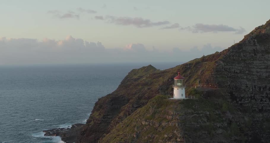 A lighthouse on a coastal mountain ledge
