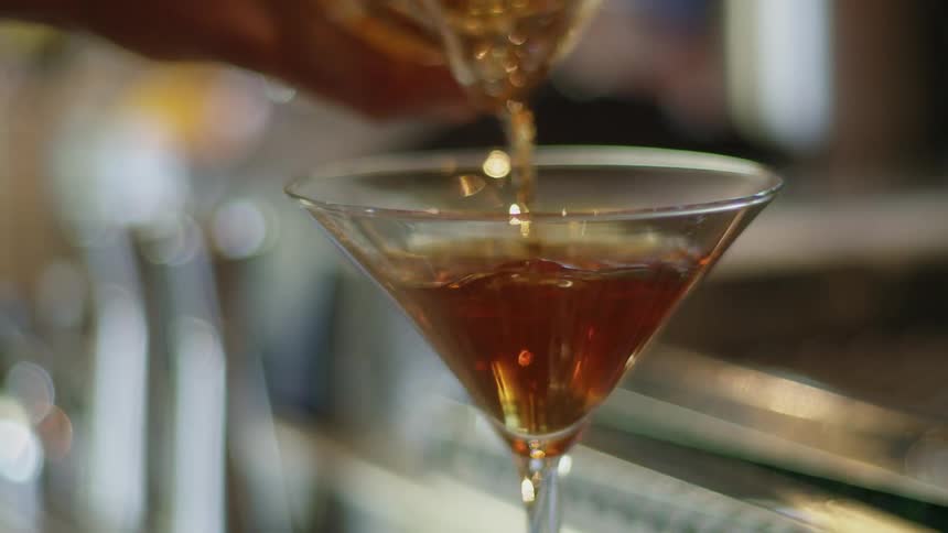 Alcohol being poured into a glass