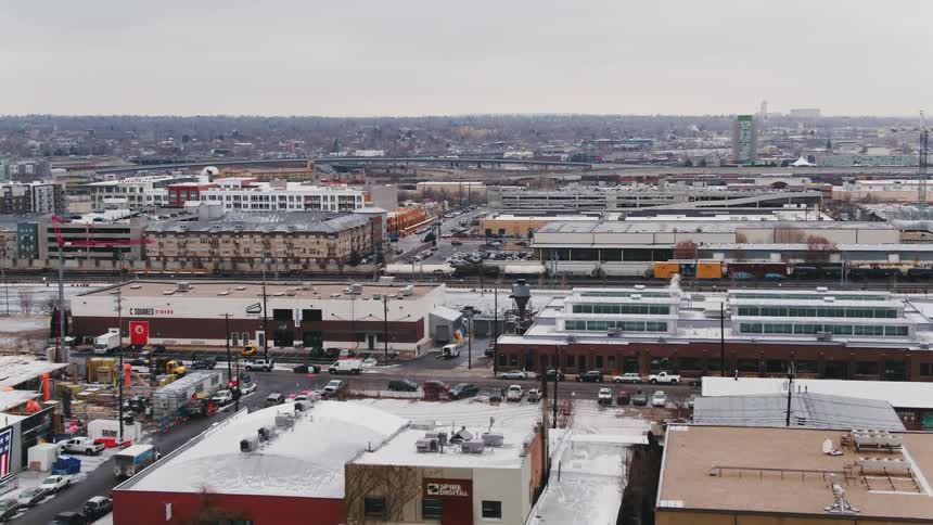 Storefronts and businesses fill the streets of a neighborhood