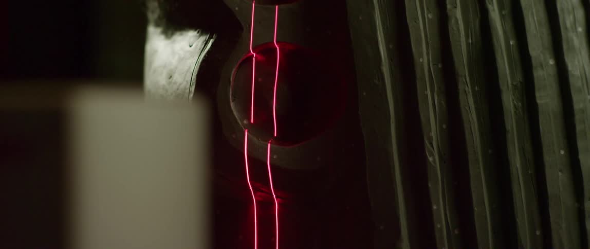 Two strands of filament glow pink