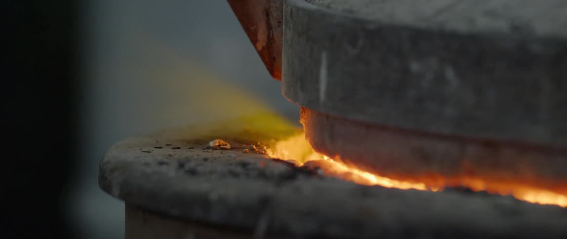 Flames glow from a kiln