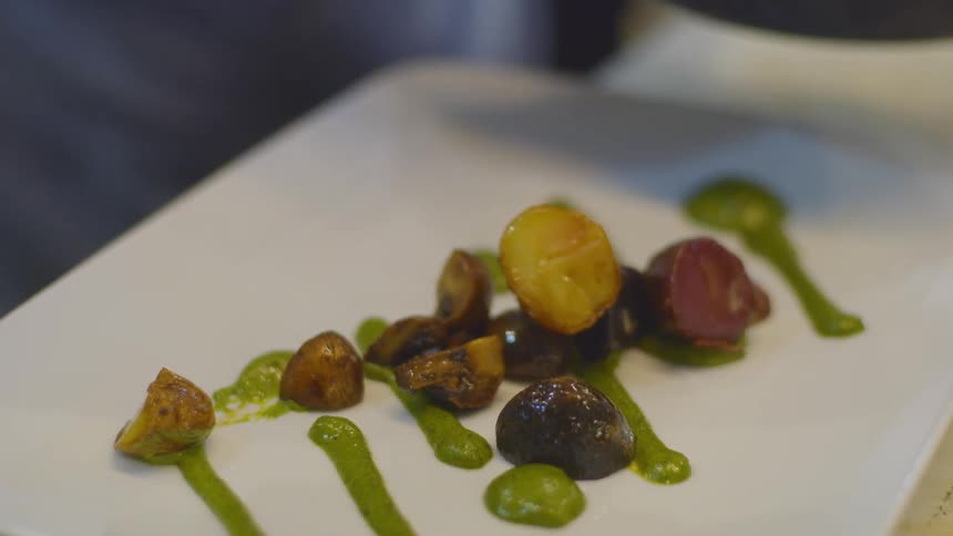 Food is being served on the plate
