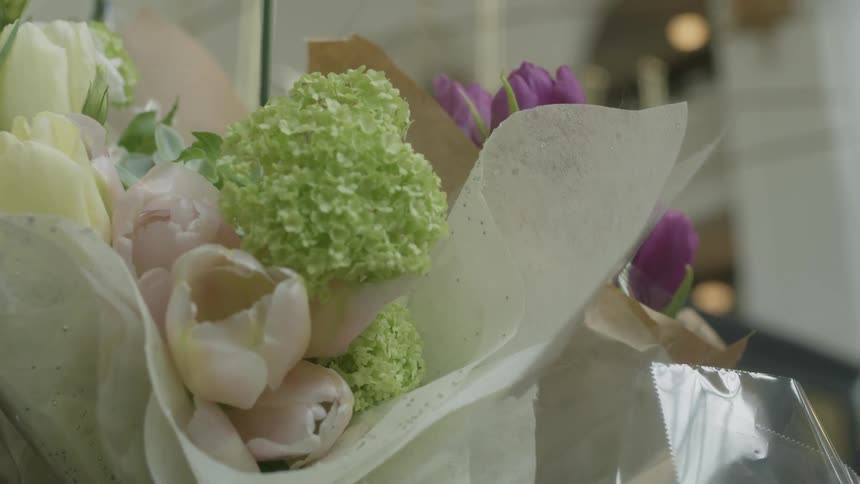Bouquets of flowers wrapped in paper