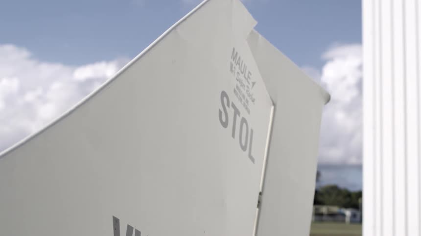 Close up of the tail fin of a plane moving in the wind