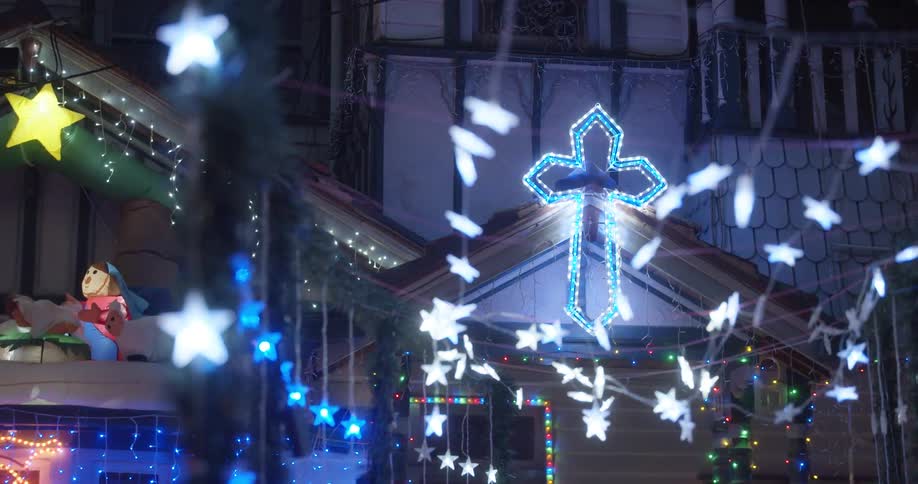 Outdoor christmas decorations and lights at night