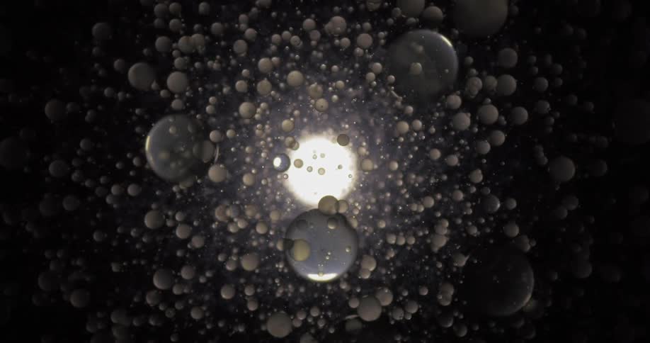 Liquid drops float in a fluid