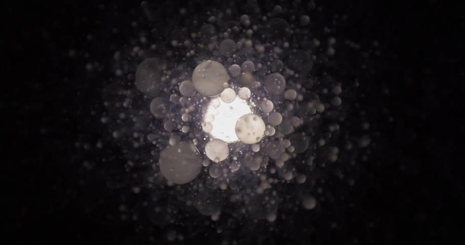 Bubbles and particles cluster together in the dark
