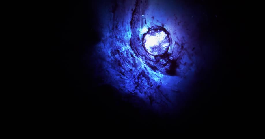 Abstract view of blue liquid mixing together