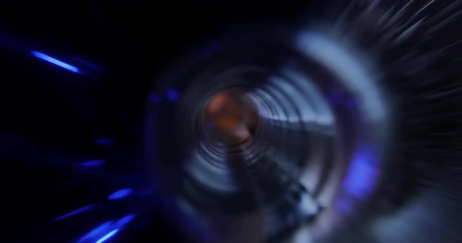 Light reflects around the inside of a spinning tube