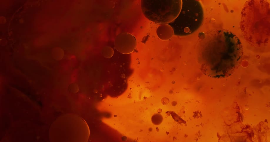 The orbs move around in the liquid