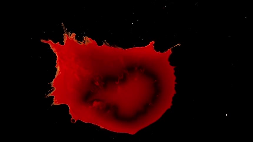 A red blob of ink grows and shrinks