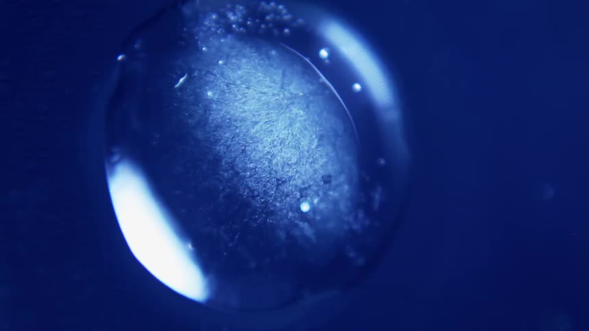 Extreme close up of a drop of water